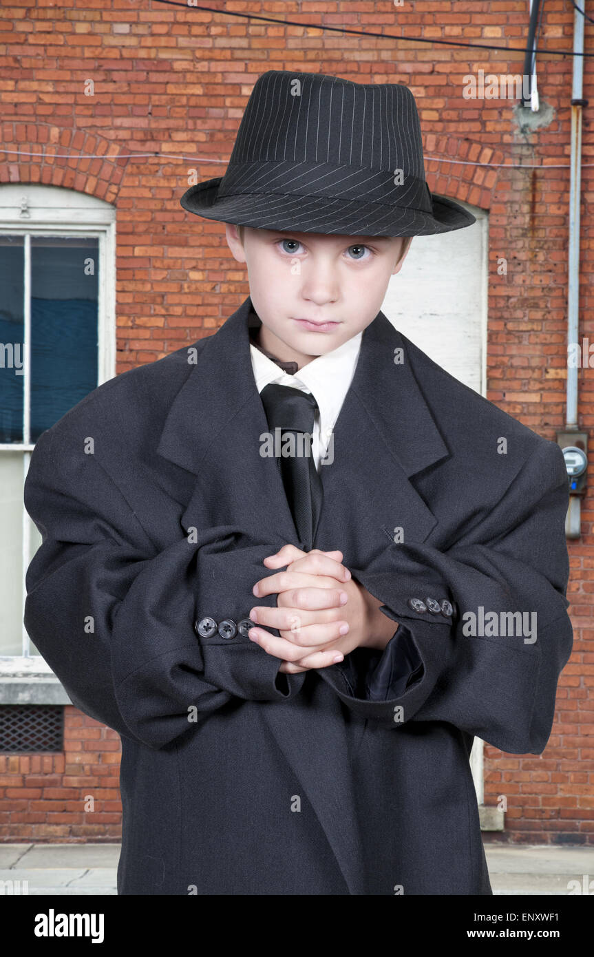 Boy in Oversized Clothes Stock Photo - Alamy