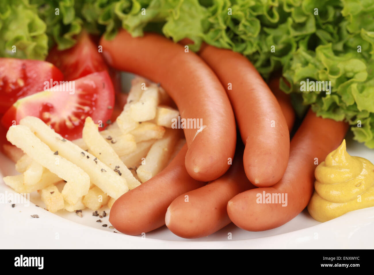 Wiener Wurst mit Pommes Stock Photo