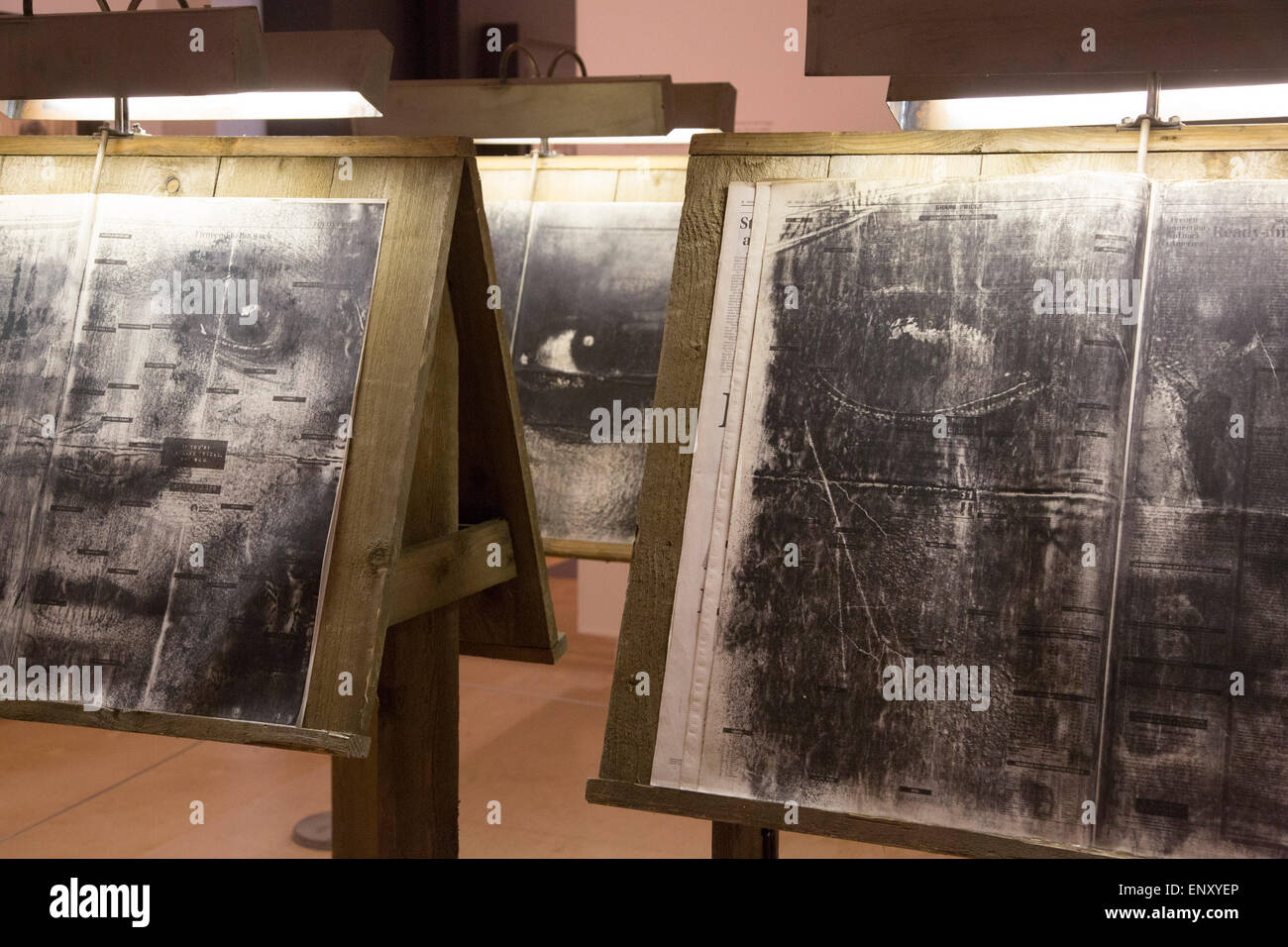London, UK. 12 May 2015. Press preview of the exhibition 'Peter Kennard: Unofficial War Artist' at the Imperial War Museum in London, UK. The exhibition opens on 14 May 2015 and runs until 30 May 2016. This free exhibition at IWM London will be the first major retrospective of Kennard's work charting a 50 year career featuring over 200 artworks and related items, including a new art installation ‘Boardroom’ created especially for the exhibition. Political artist Peter Kennard has inpired artists from Mark Wallinger to Banksy. Stock Photo