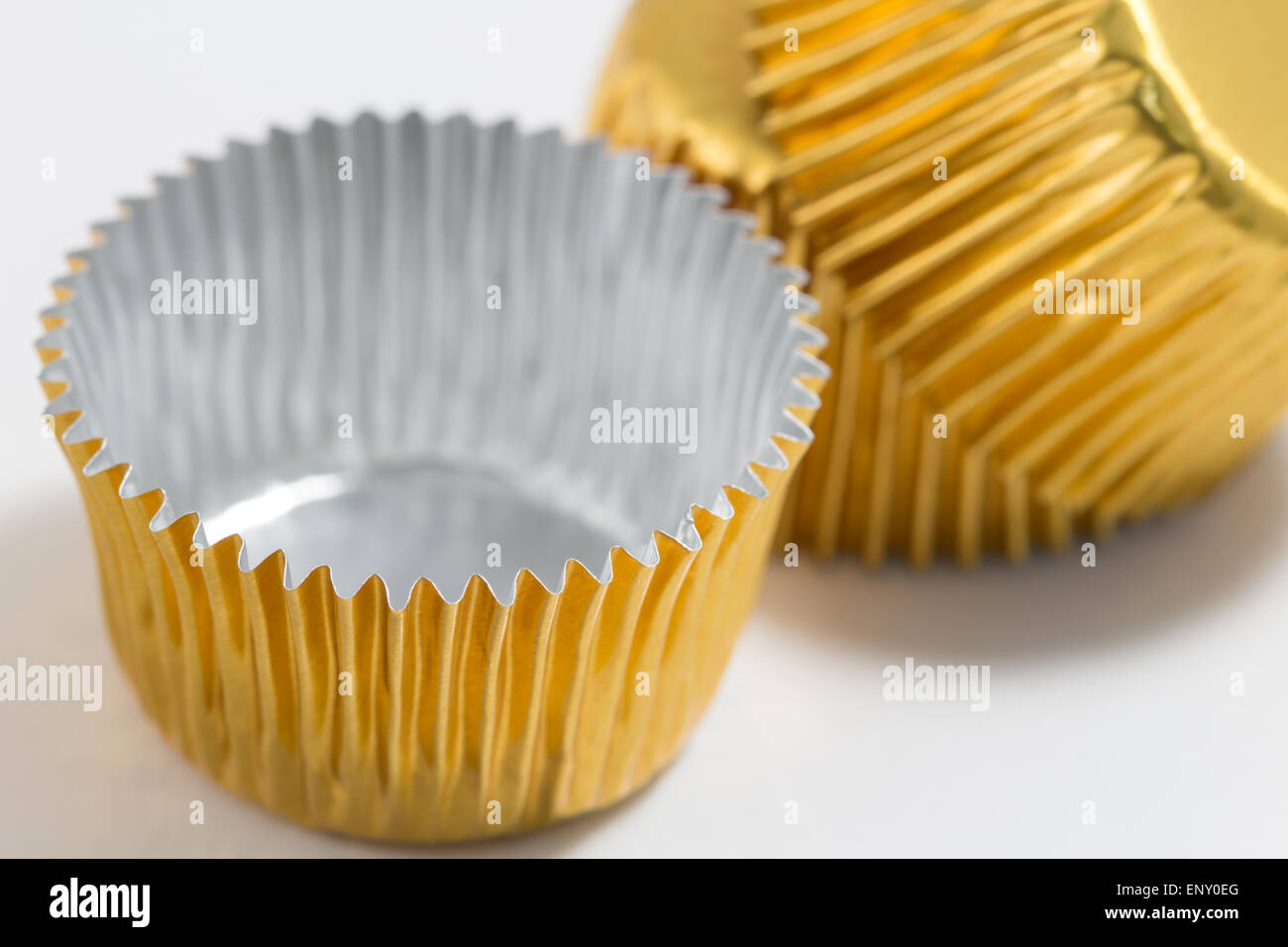 Group of Aluminum baking cup in gold, red and blue Stock Photo Alamy