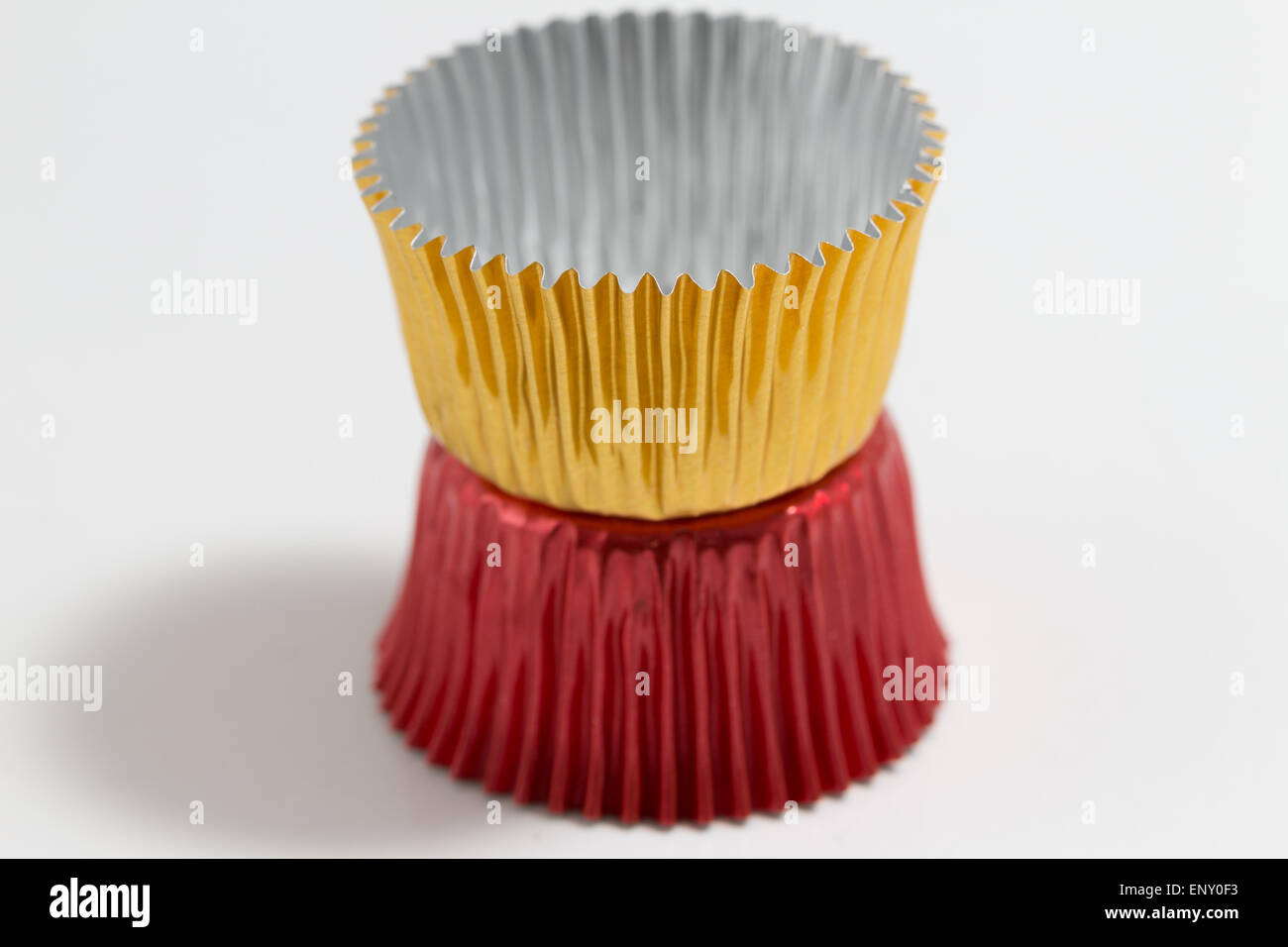 Group of Aluminum baking cup in gold, red and blue Stock Photo Alamy