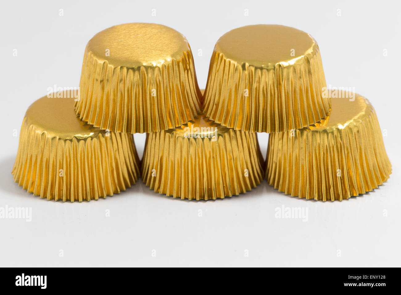 Group of Aluminum baking cup in gold, red and blue Stock Photo Alamy