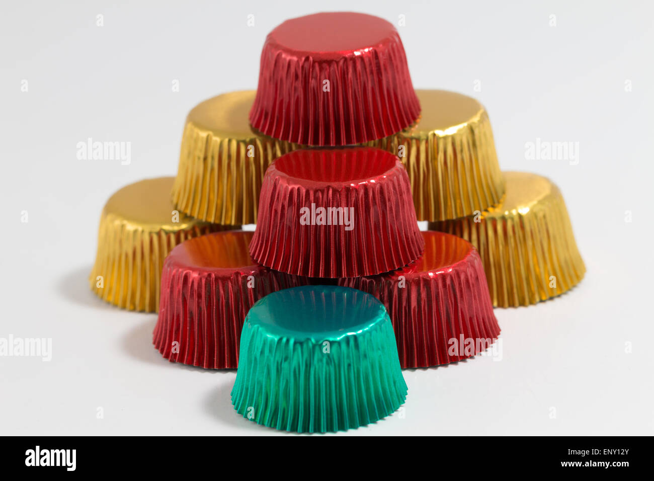 Group of Aluminum baking cup in gold, red and blue Stock Photo Alamy