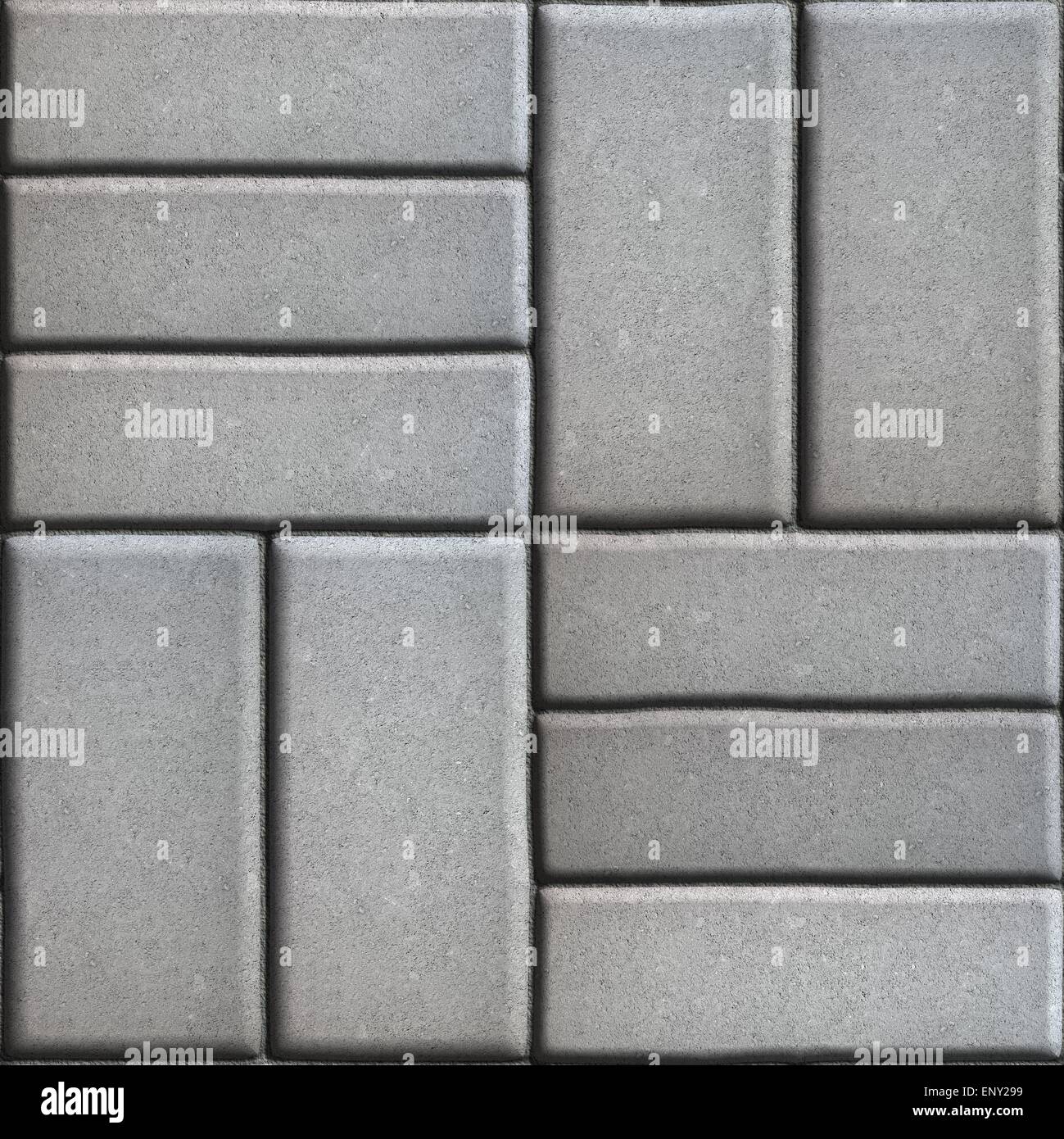 Gray Pave Slabs Rectangles Arranged Perpendicular to Each other Two or Three Pieces. Stock Photo