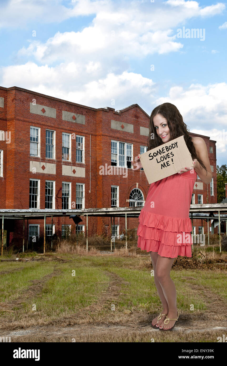 Woman Holding a Sign Stock Photo - Alamy