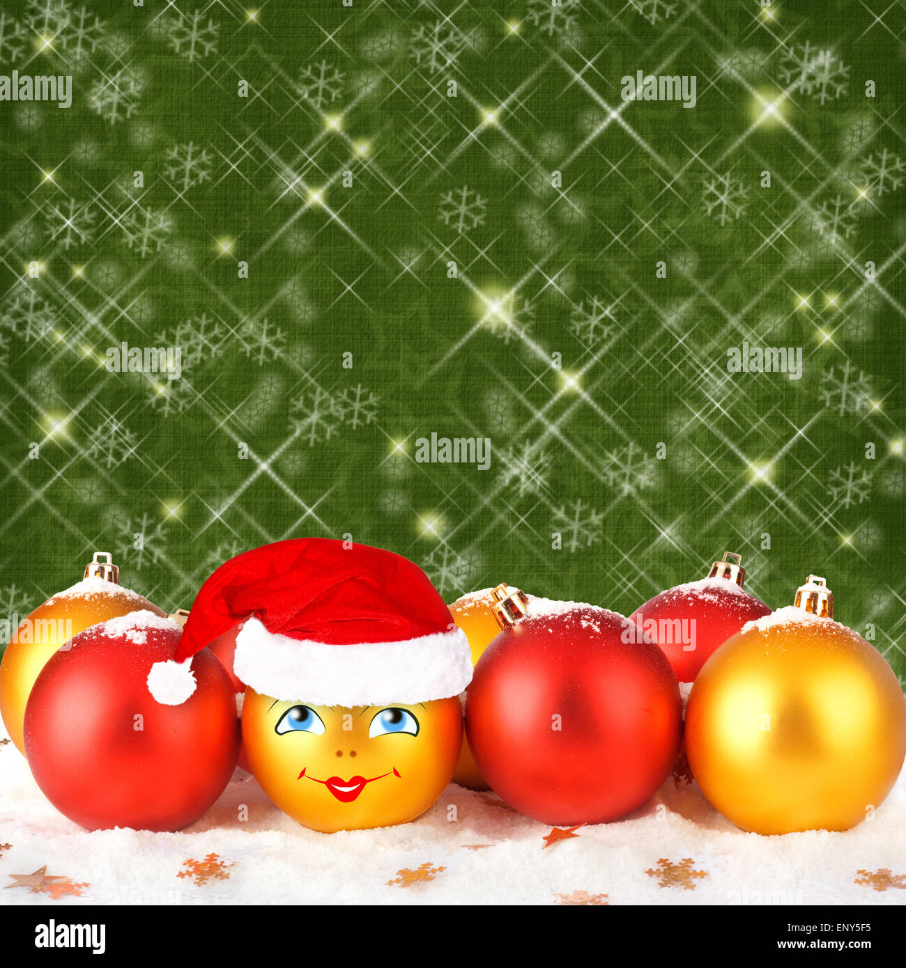 Christmas ball in the hat of Santa Claus  on the abstract background with stars Stock Photo