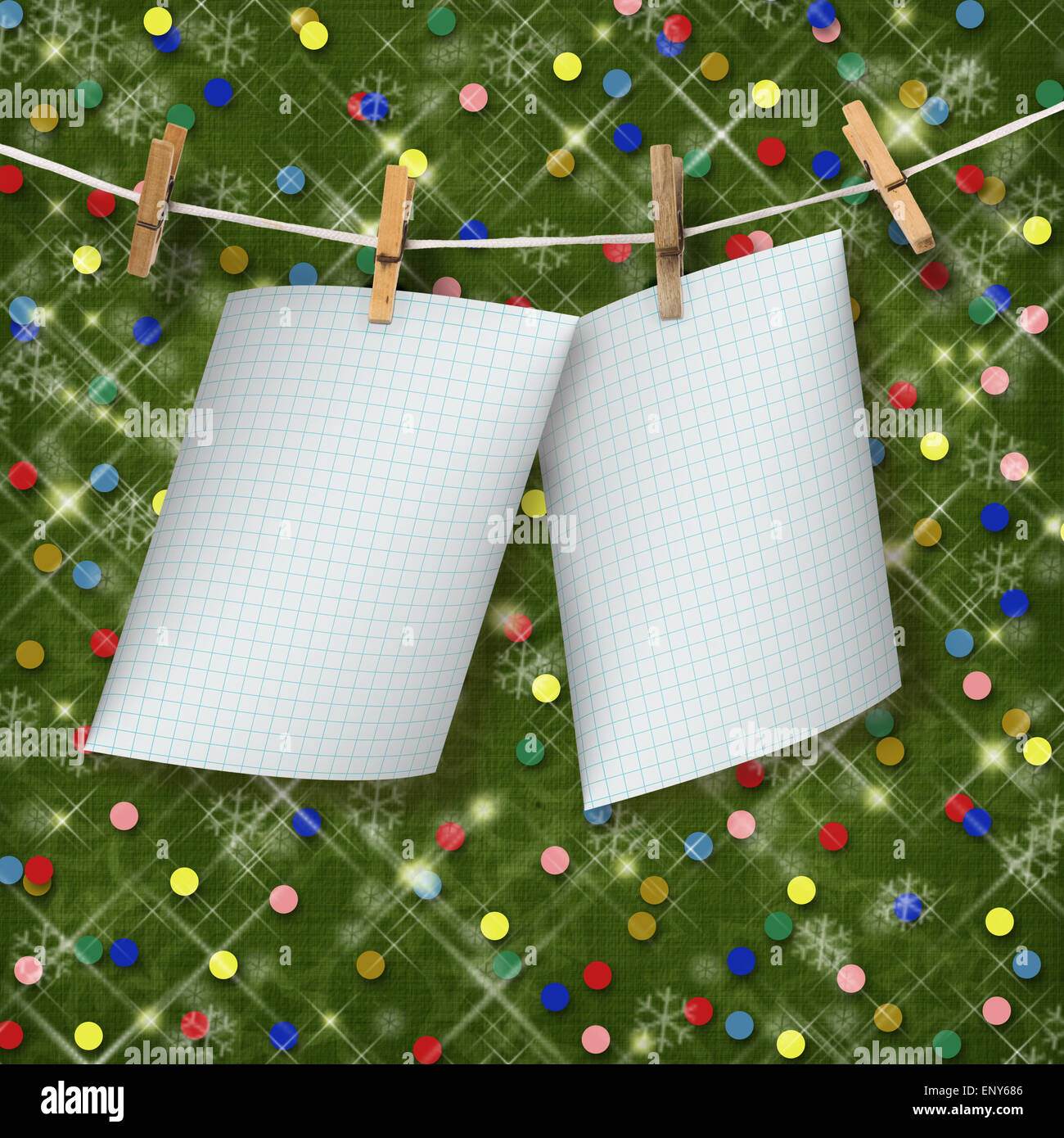 Greeting card hanging on a rope and clothespins on the abstract