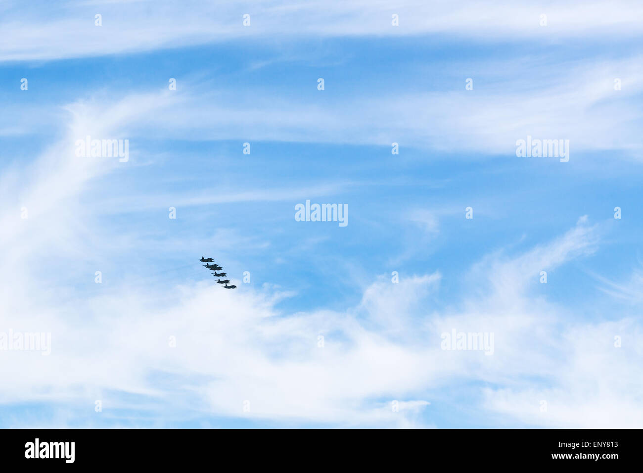 blue sky with white clouds and military fighter planes Stock Photo - Alamy