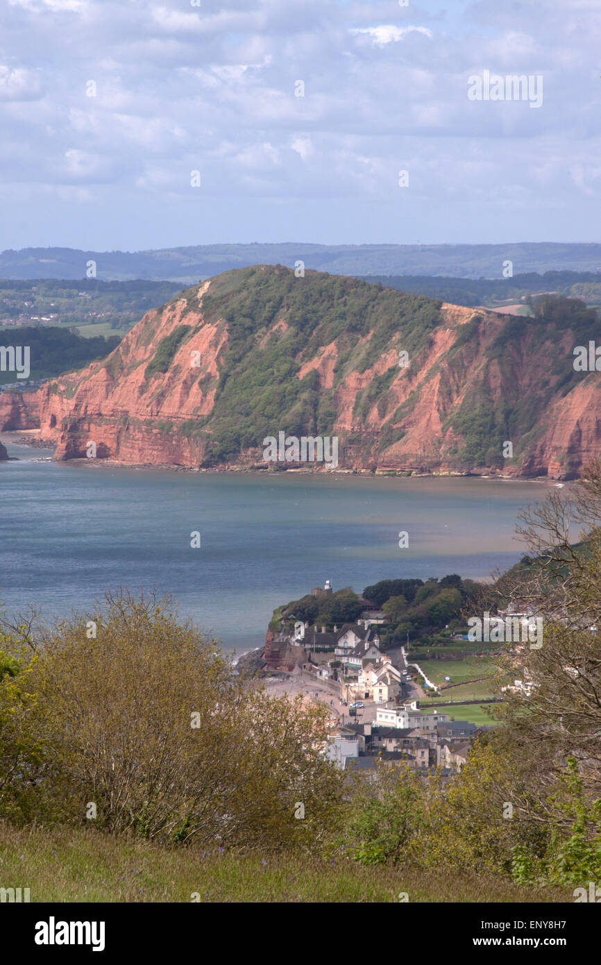 Sidmouth. The South West Coastal Path at Salcombe Hill cliff, at Sidmouth, Devon, with the town and Lyme Bay behind. Stock Photo