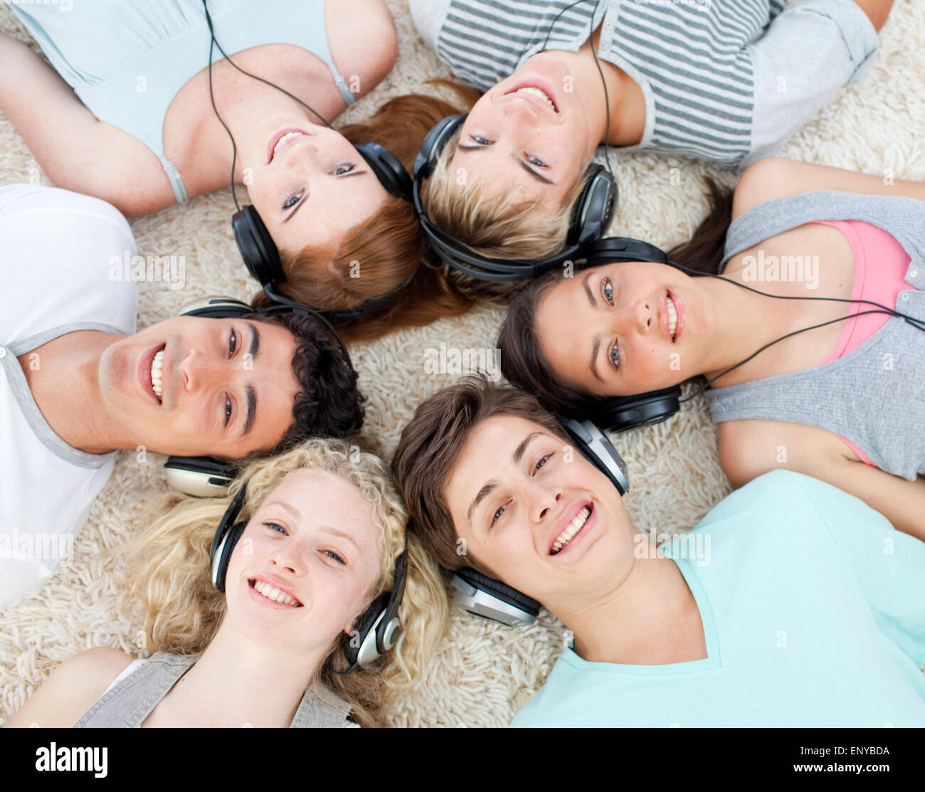 High angle of teenagers listening to music Stock Photo - Alamy