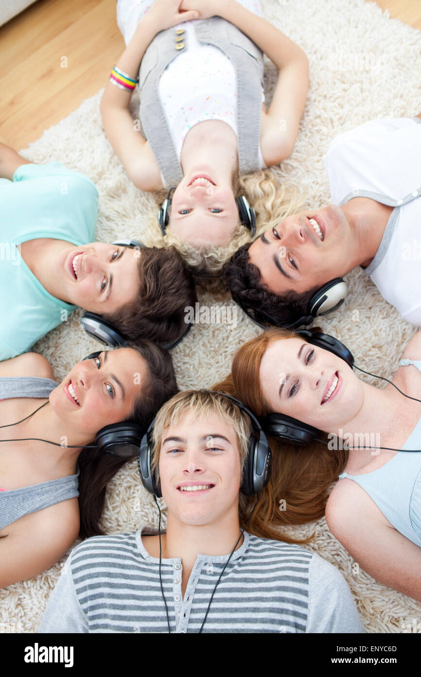 High angle of teenagers listening to music Stock Photo - Alamy