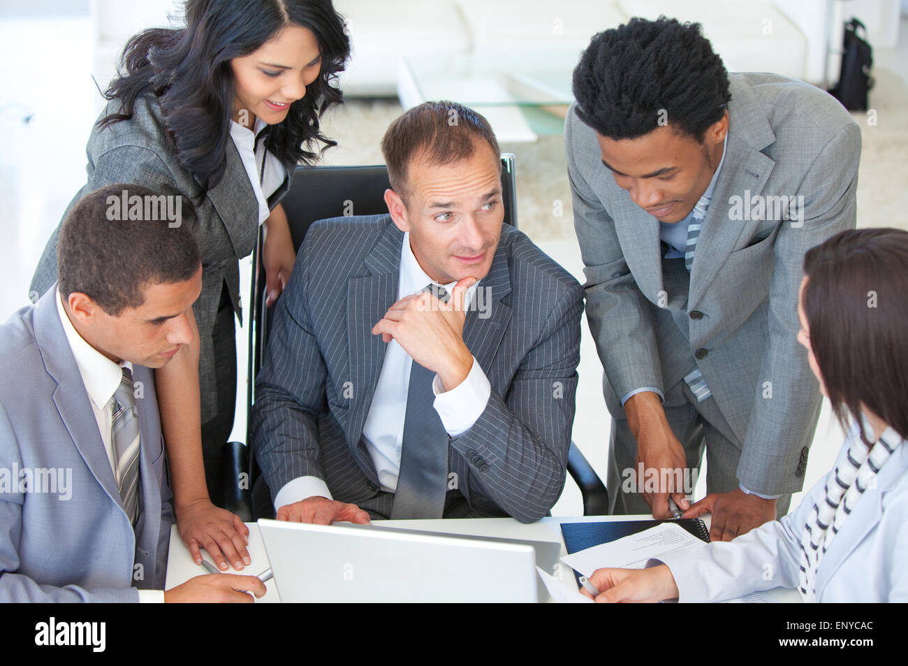 Multi-ethnic business people working together in a project Stock Photo ...
