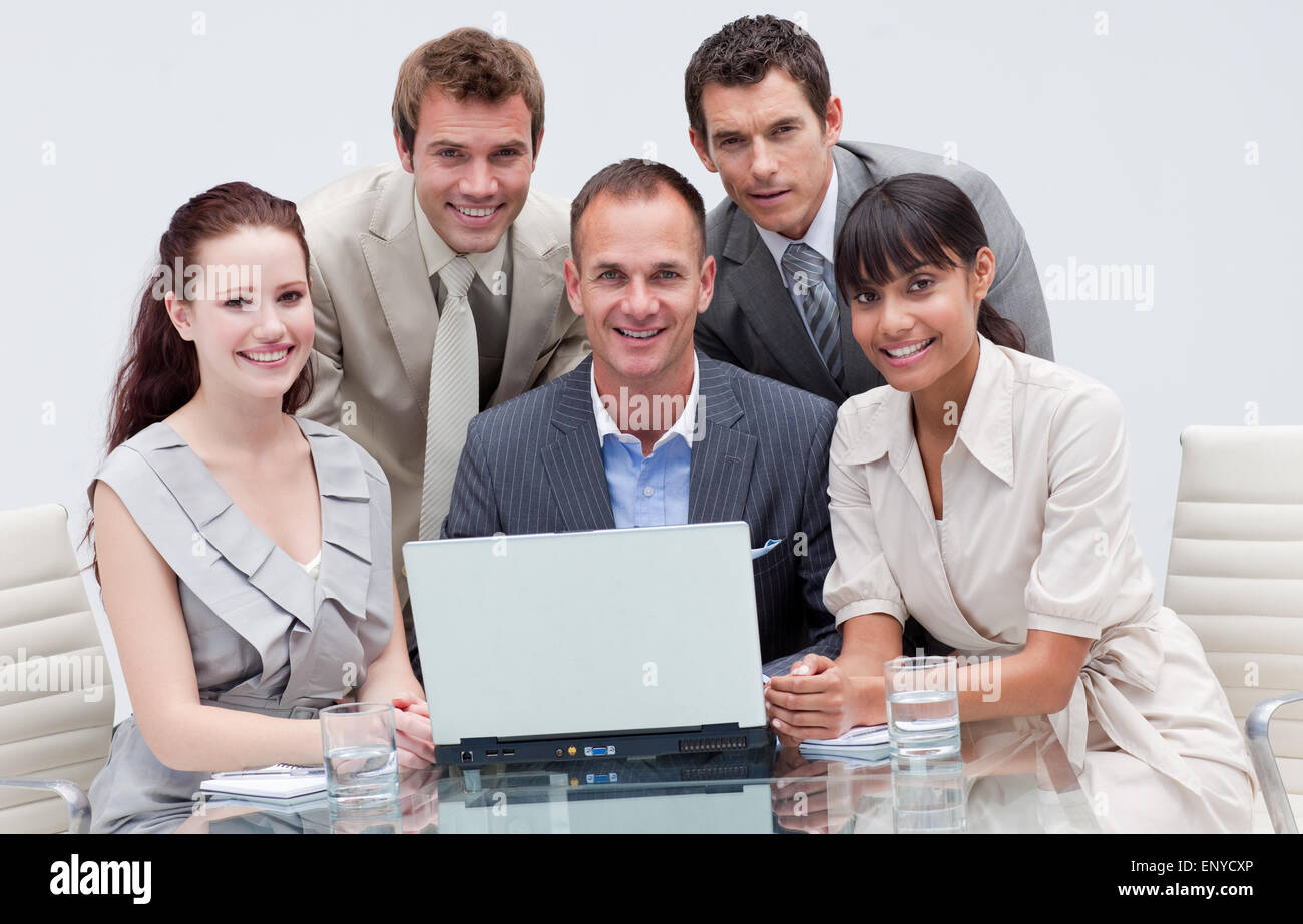 Multi-ethnic business team working together in an office Stock Photo ...