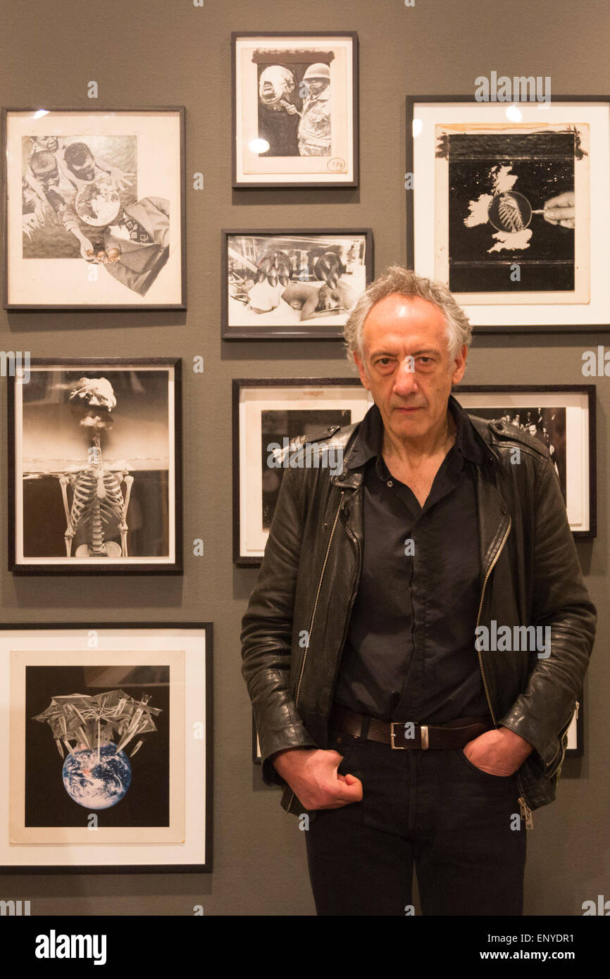 London, UK. 12 May 2015. Pictured: artist Peter Kennard (born 1949). Press preview of the exhibition 'Peter Kennard: Unofficial War Artist' at the Imperial War Museum in London, UK. The exhibition opens on 14 May 2015 and runs until 30 May 2016. This free exhibition at IWM London will be the first major retrospective of Kennard's work charting a 50 year career featuring over 200 artworks and related items, including a new art installation ‘Boardroom’ created especially for the exhibition. Political artist Peter Kennard has inpired artists from Mark Wallinger to Banksy. Stock Photo