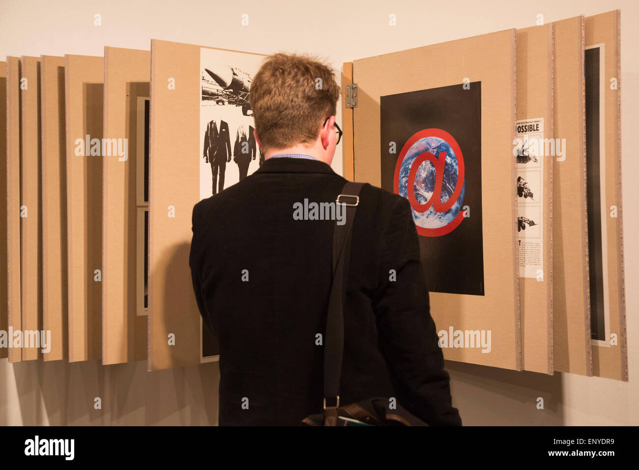 London, UK. 12 May 2015. Press preview of the exhibition "Peter Kennard: Unofficial War Artist" at the Imperial War Museum in London, UK. The exhibition opens on 14 May 2015 and runs until 30 May 2016. This free exhibition at IWM London will be the first major retrospective of Kennard's work charting a 50 year career featuring over 200 artworks and related items, including a new art installation ‘Boardroom’ created especially for the exhibition. Political artist Peter Kennard has inpired artists from Mark Wallinger to Banksy. Stock Photo