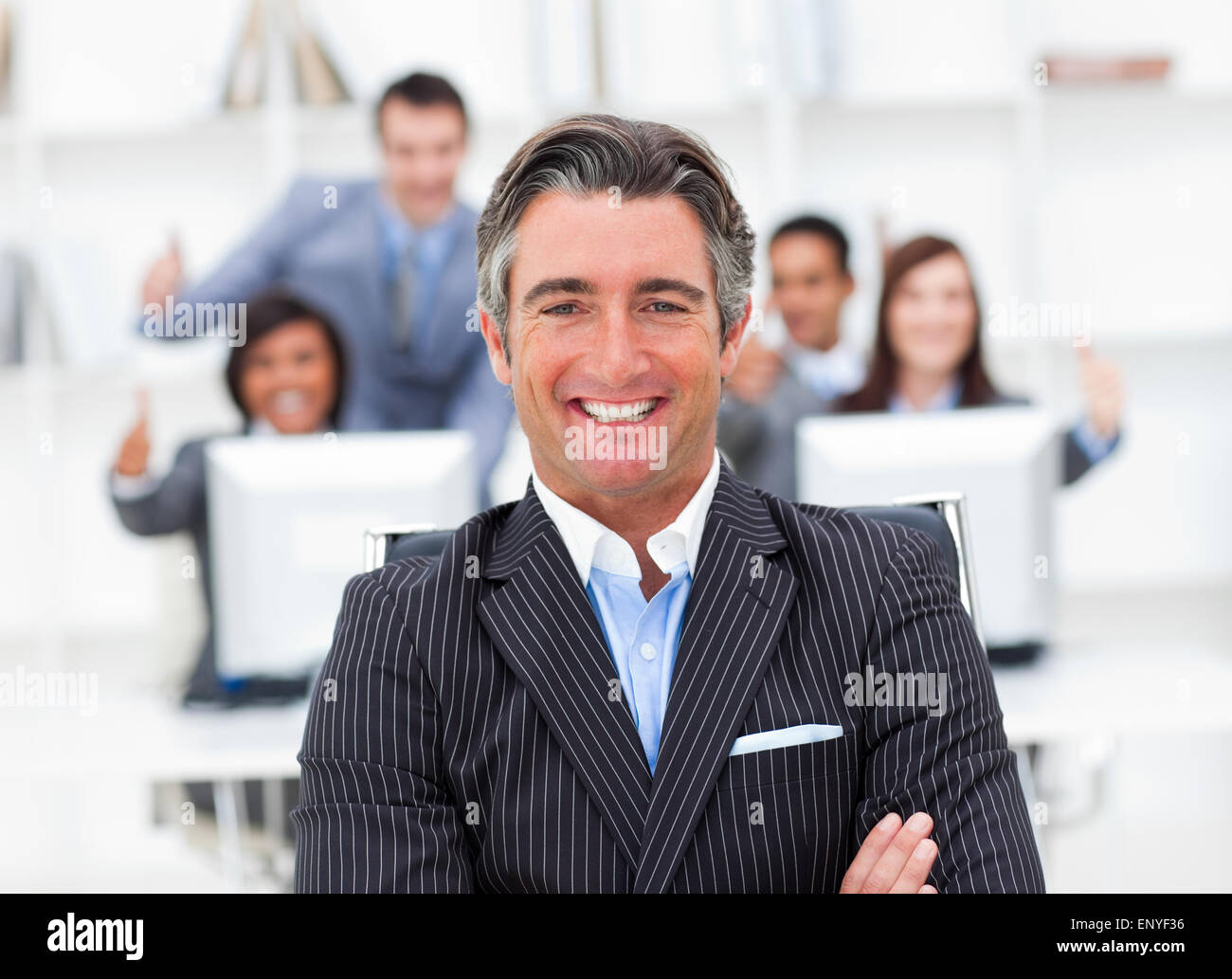 Presentation of a positive manager and his team Stock Photo Alamy