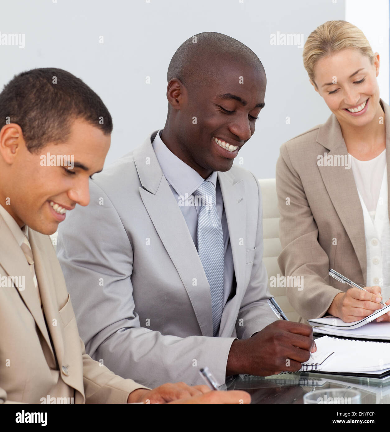 Business People Smiling in a meeting Stock Photo - Alamy