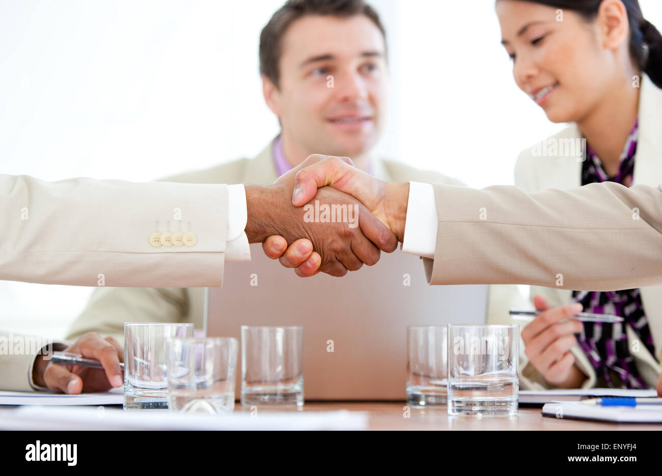 Close-up of two business people greeting each other Stock Photo - Alamy