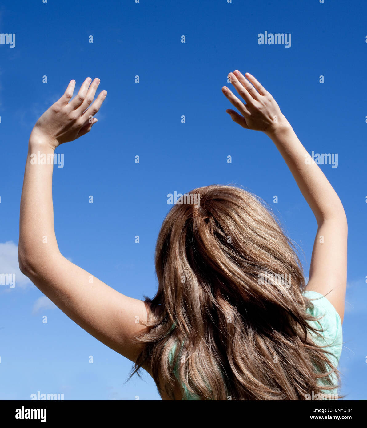 Smiling woman punching the air outdoor Stock Photo Alamy