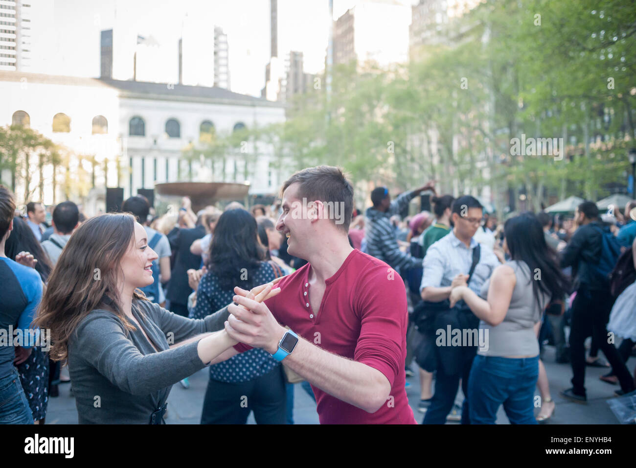 Hundreds channel their inner Fred Astaire and Ginger Rogers as they waltz the night away on the opening night of Dancing in Bryant Park, with a Waltz Ball, in New York on Wednesday, May 6, 2015. Everyone from beginners to amateur competitors participated in the weekly event, featuring a different style of dance each week. Live music and instruction complimented the popular event. (© Richard B. Levine) Stock Photo