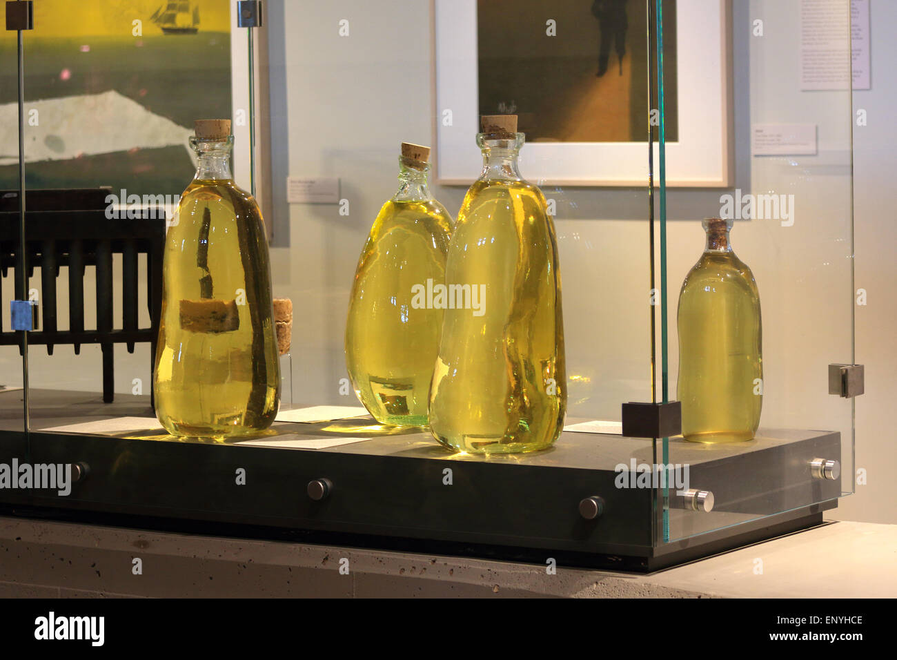 Nantucket Massachusetts Whaling museum. Exhibit displaying sperm whale oil spermaceti oil, stored in glass bottles. Nantucket Island. Stock Photo