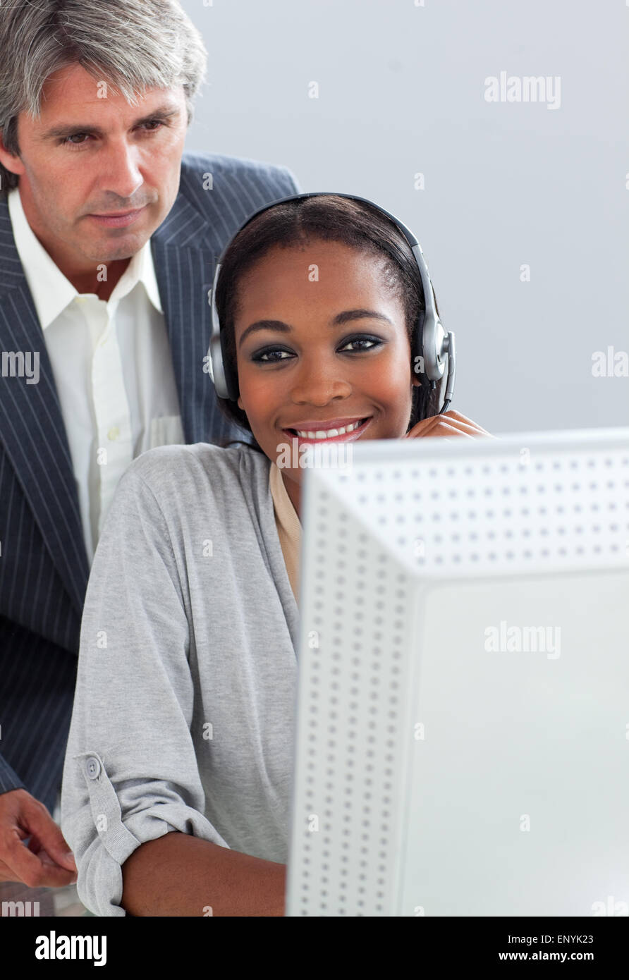 Mature manager checking his employee's work Stock Photo - Alamy