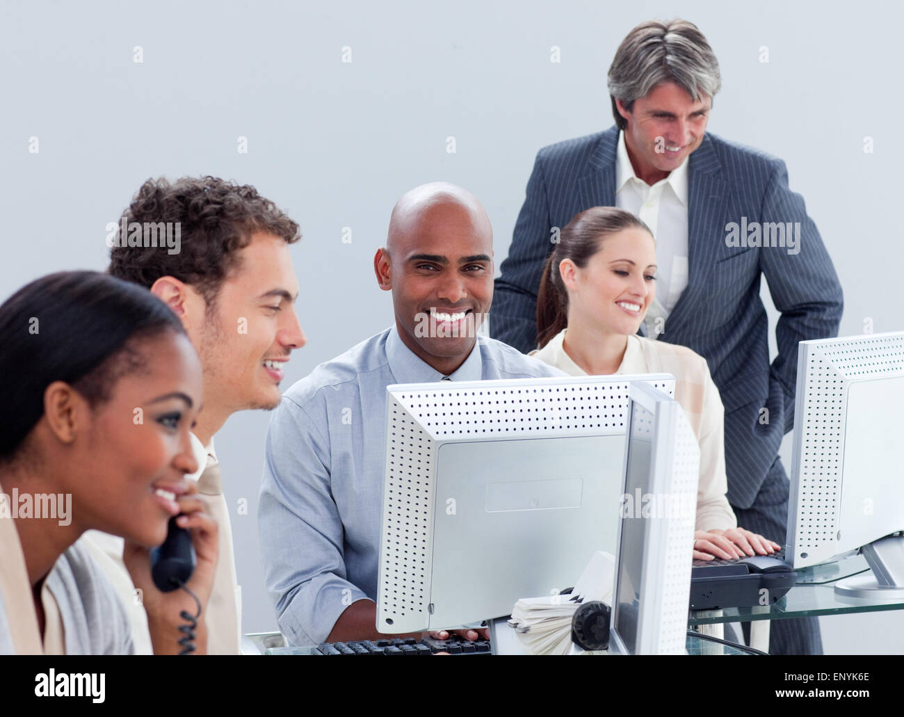 Positive business group working hard in the office Stock Photo Alamy