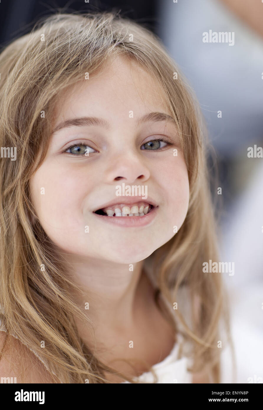 Little girl smiling at the camera Stock Photo - Alamy