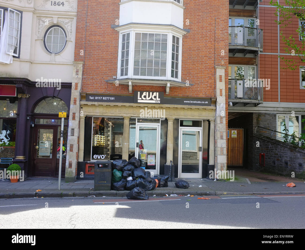 A pile of bin bags outside a shop in Bristol Stock Photo Alamy