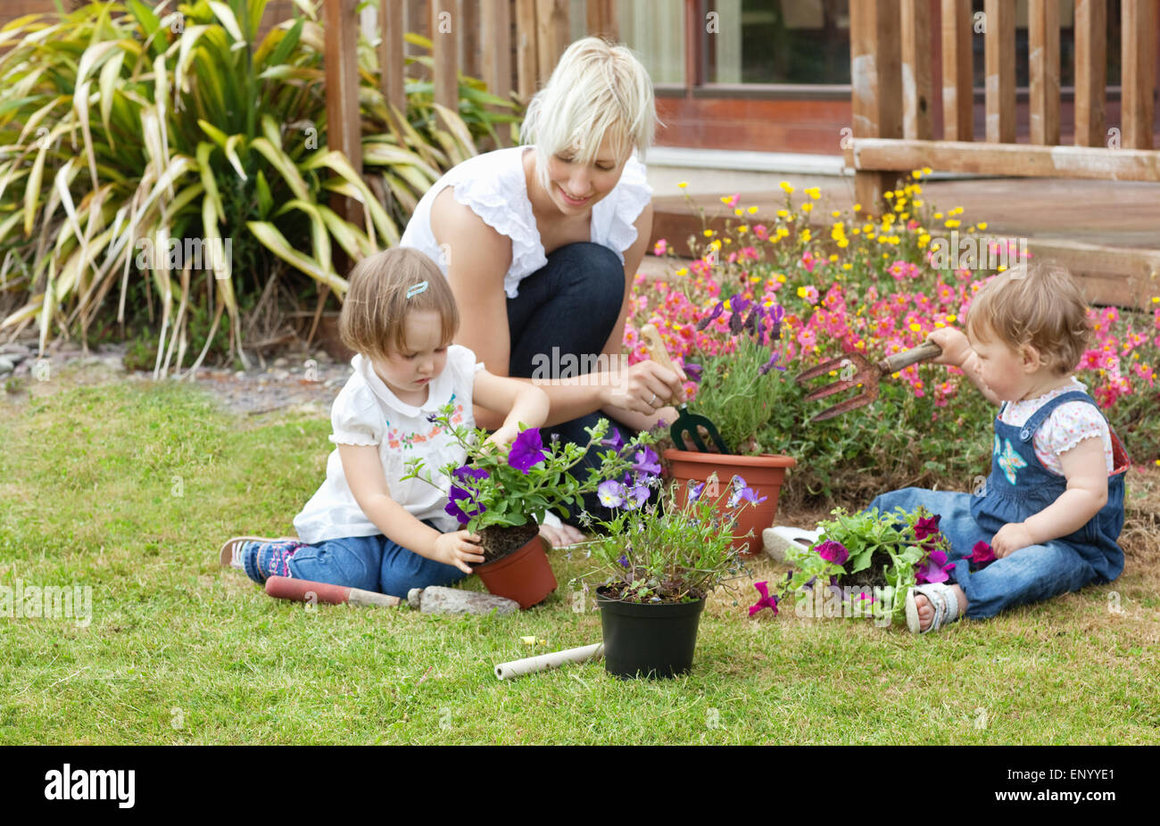 Family with colorful flowers Stock Photo - Alamy