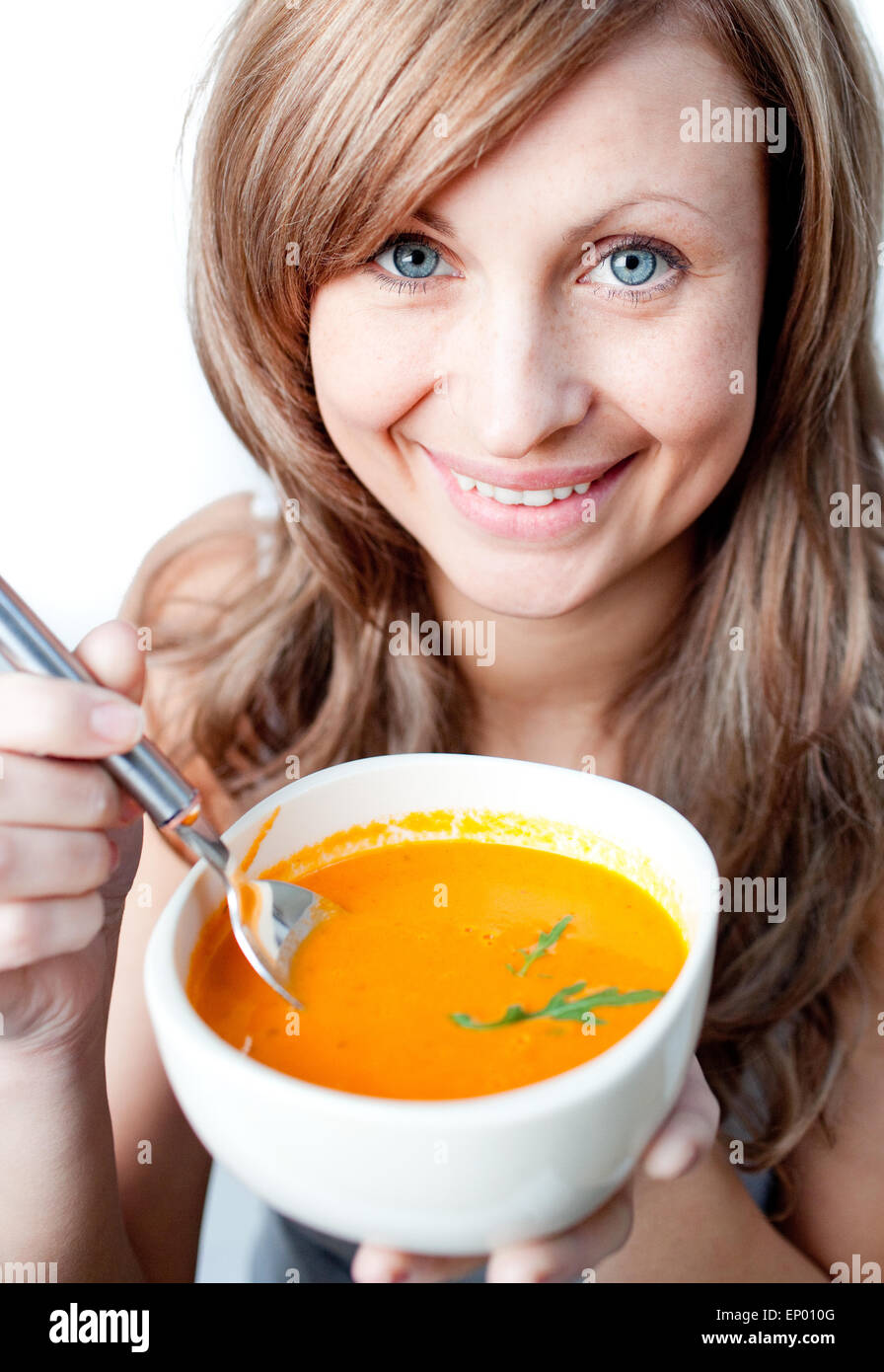 Positive woman holding a soup bowl Stock Photo Alamy