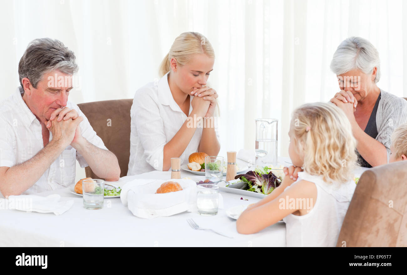 Children praying table hi-res stock photography and images - Alamy