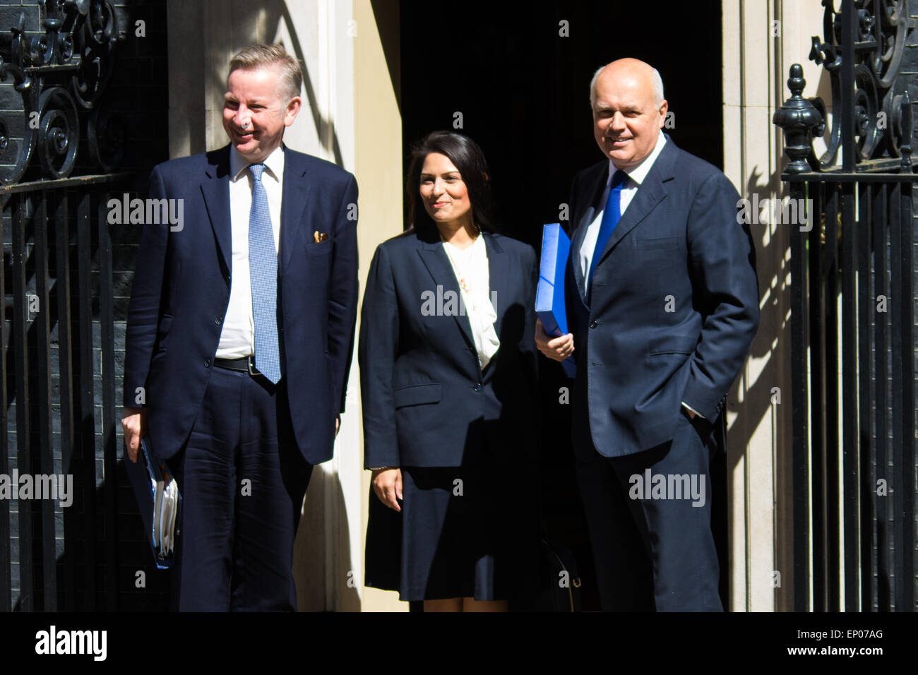 Downing Street, London, UK. 12th May, 2015. The all-conservatives Cabinet ministers gather for their first official meeting at Downing Street. PICTURED: Secretary of State for Justice Michael Gove, left, Minister of State for Employment Priti Patel and Secretary of State for Work and Pensions Iain Duncan-Smith. Credit:  Paul Davey/Alamy Live News Stock Photo
