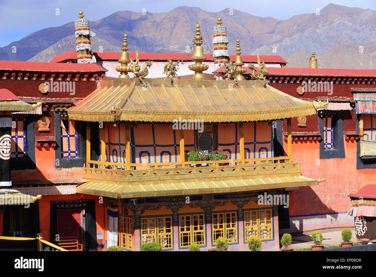 Gilded roofs and decoration -dhvajas-lotus flowers-makaras-garudas- atop oriel in the courtyard of the Johang temple.Lhasa-Tibet Stock Photo