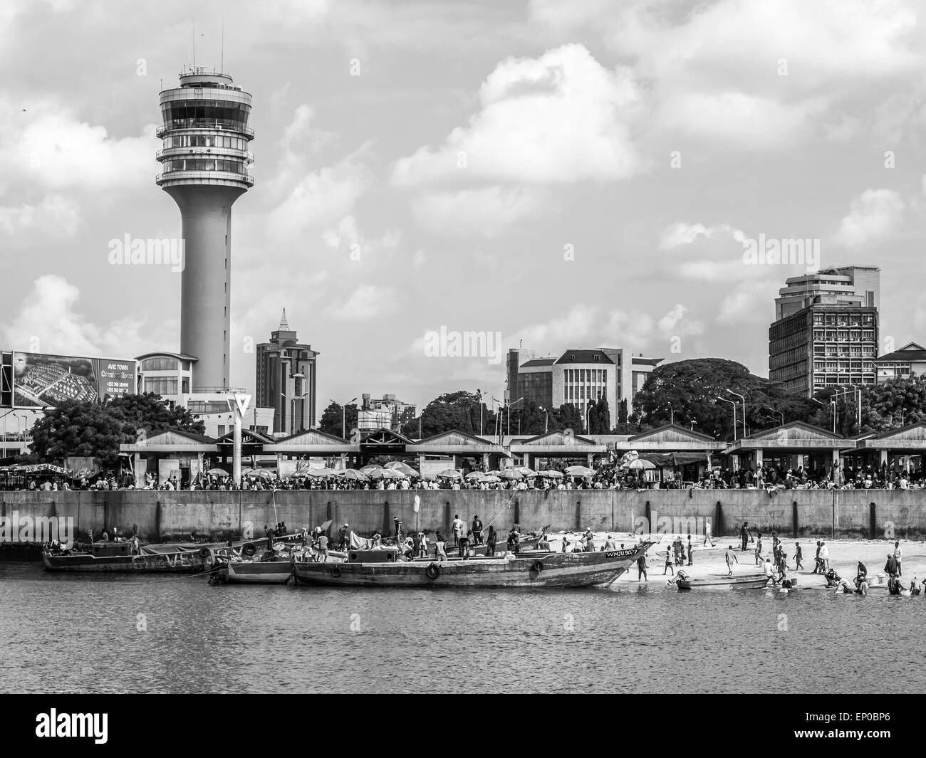 Waterfront of Dar es Salaam, Tanzania in East Africa, with maritime control tower and the fish market. Black and white. Stock Photo
