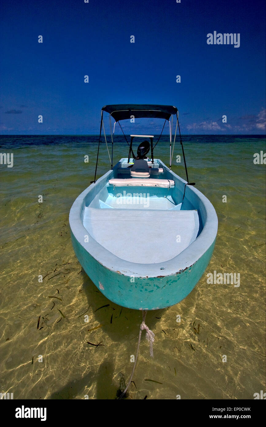 a boat in the blue lagoon of sian kaan in mexico Stock Photo