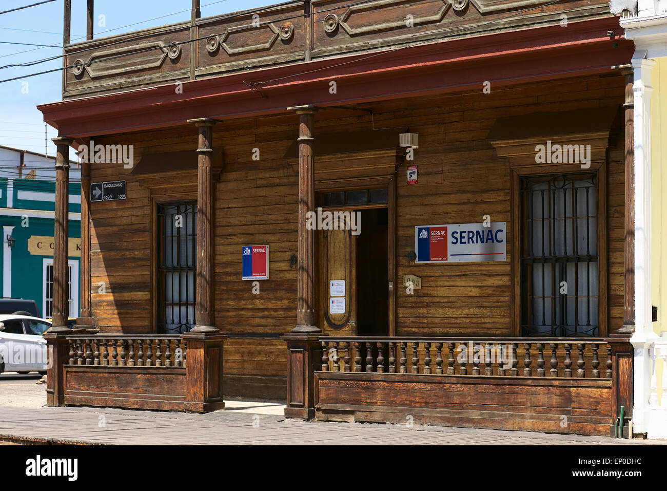 Typical wooden building housing the Sernac office on Baquedano pedestrian boulevard in Iquique, Chile Stock Photo
