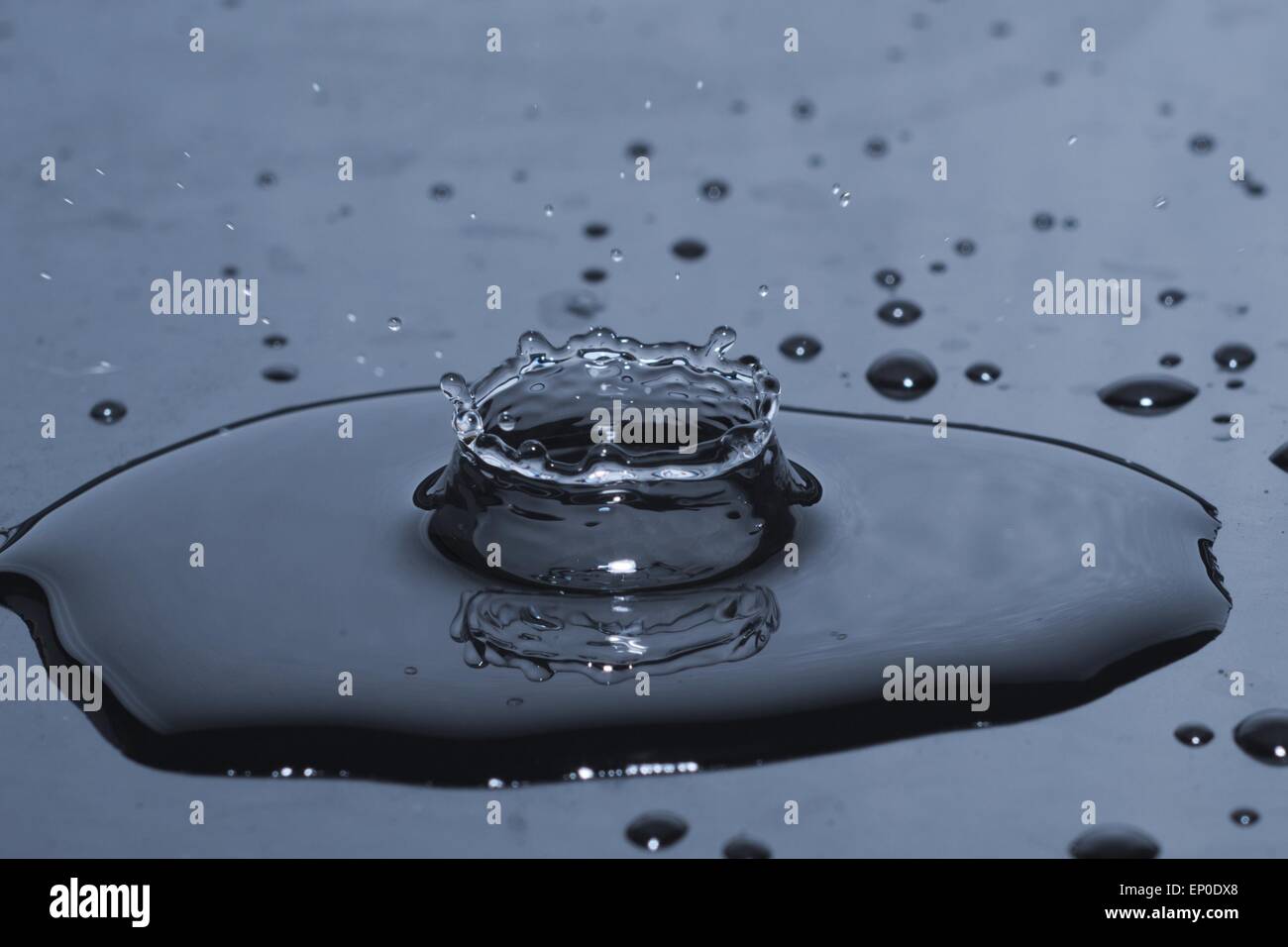 Water drop splash in crown shape Stock Photo
