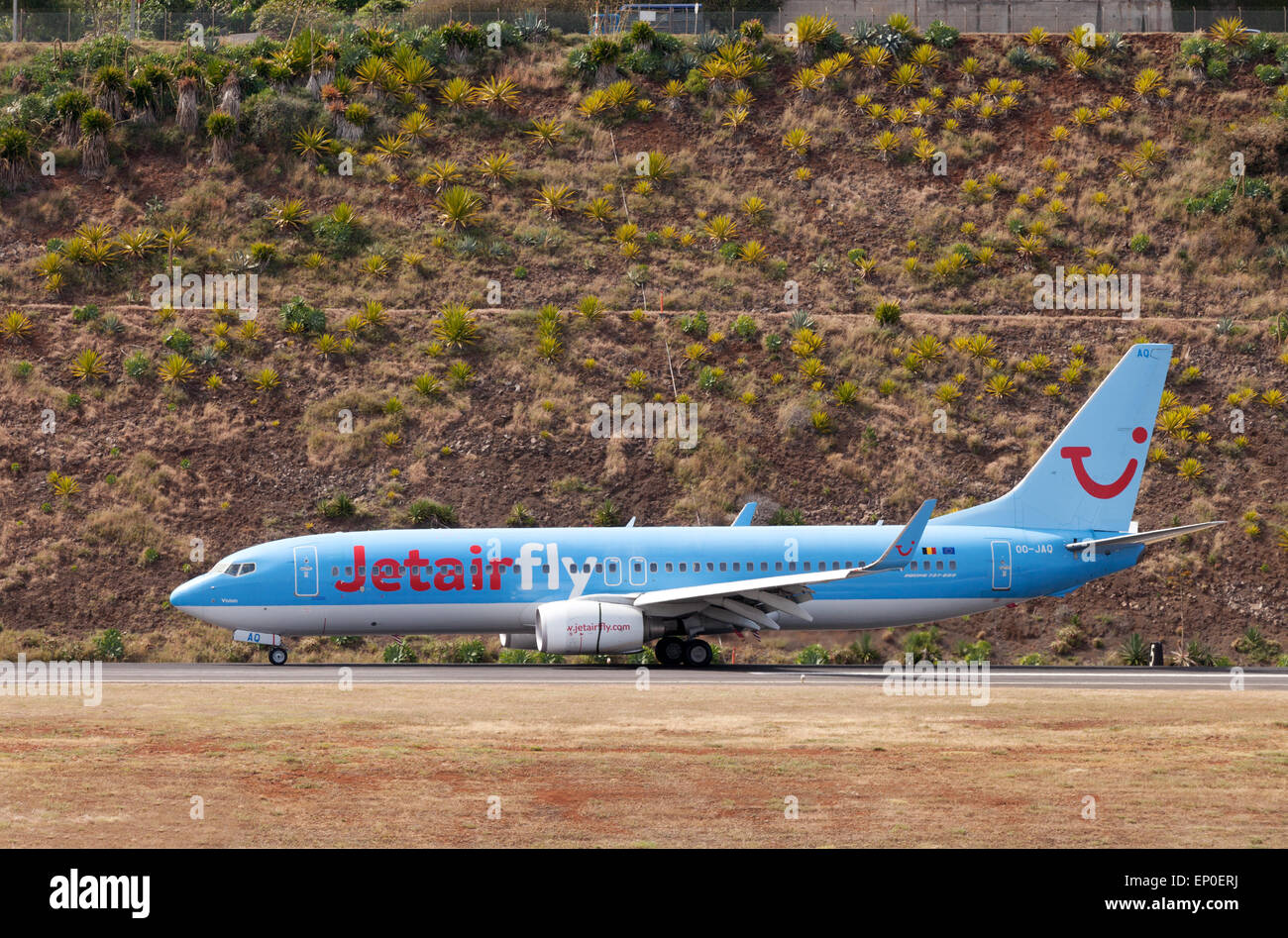 A Jetairfly Boeing 737-800 plane on the ground at Funchal airport, Madeira, Europe. Stock Photo