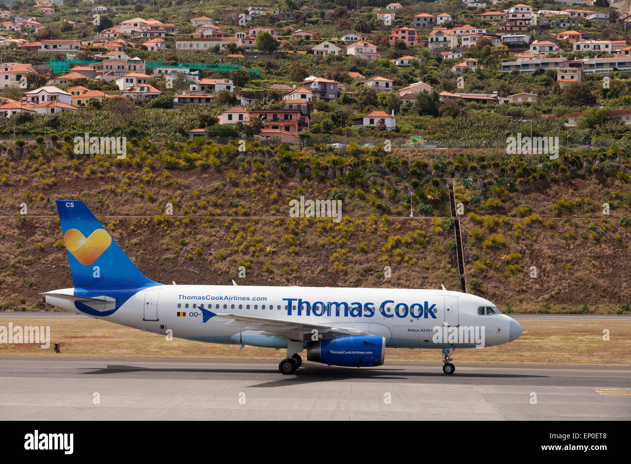 A Thomas Cook Airlines Airbus A319-100 plane at Funchal airport, Madeira, Europe Stock Photo