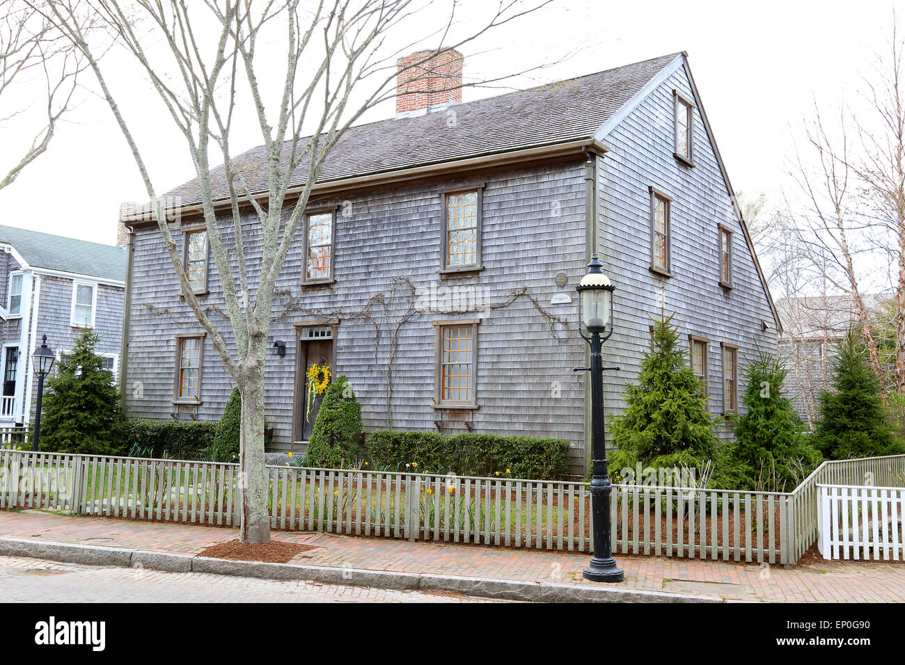 Nantucket Massachusetts on Nantucket Island. Old wooden house with flower wreath on Christopher Starbuck house, circa 1690. Stock Photo