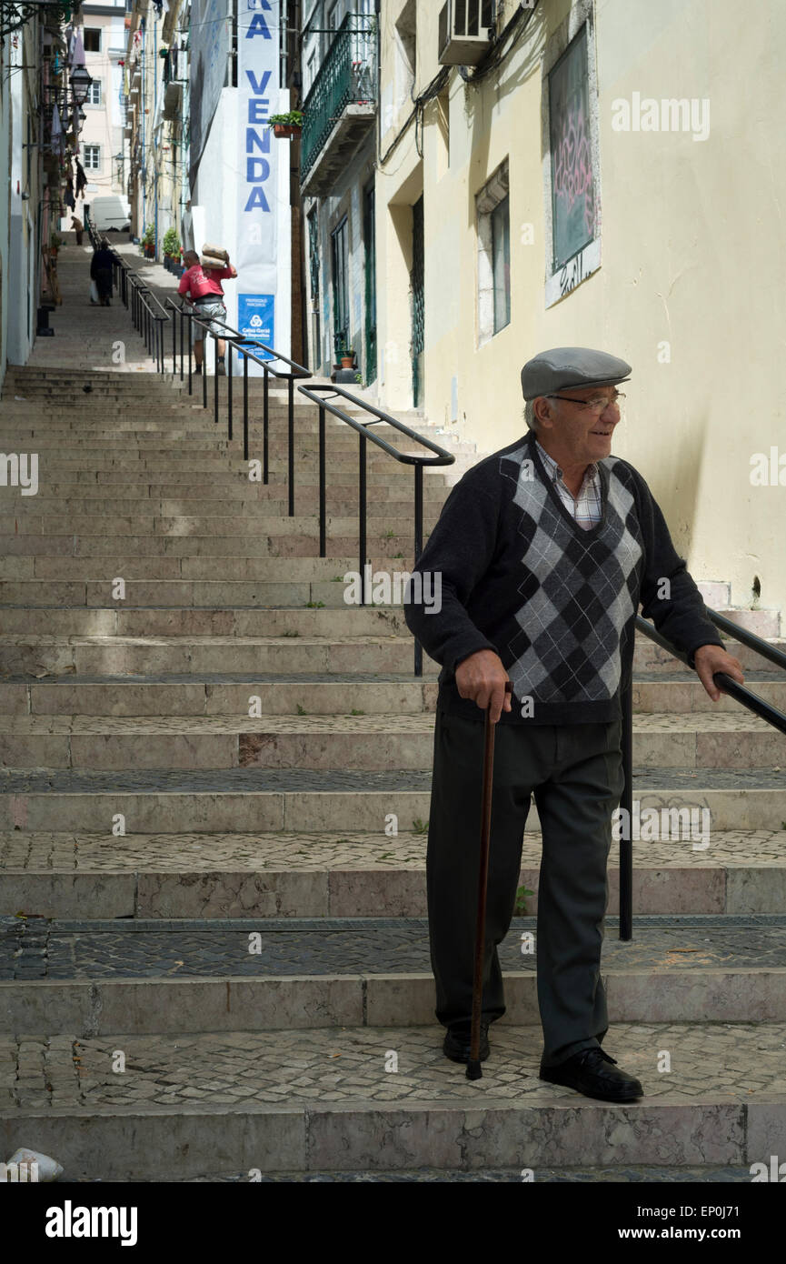 Old man walking near board with posters on street · Free Stock Photo