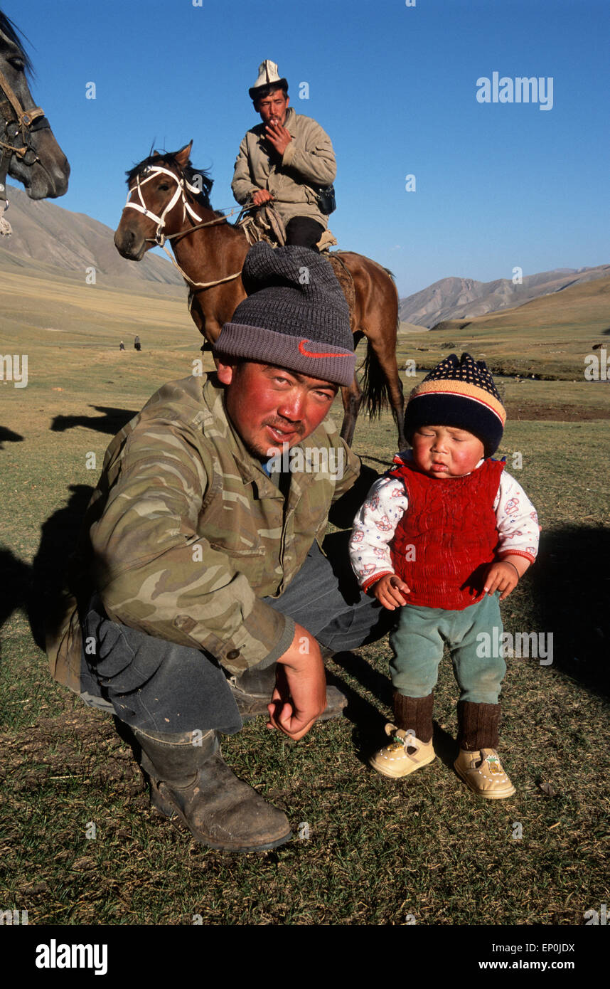 Proud Kyrgyz father and his son, Kyrgyzstan, Central Asia Stock Photo