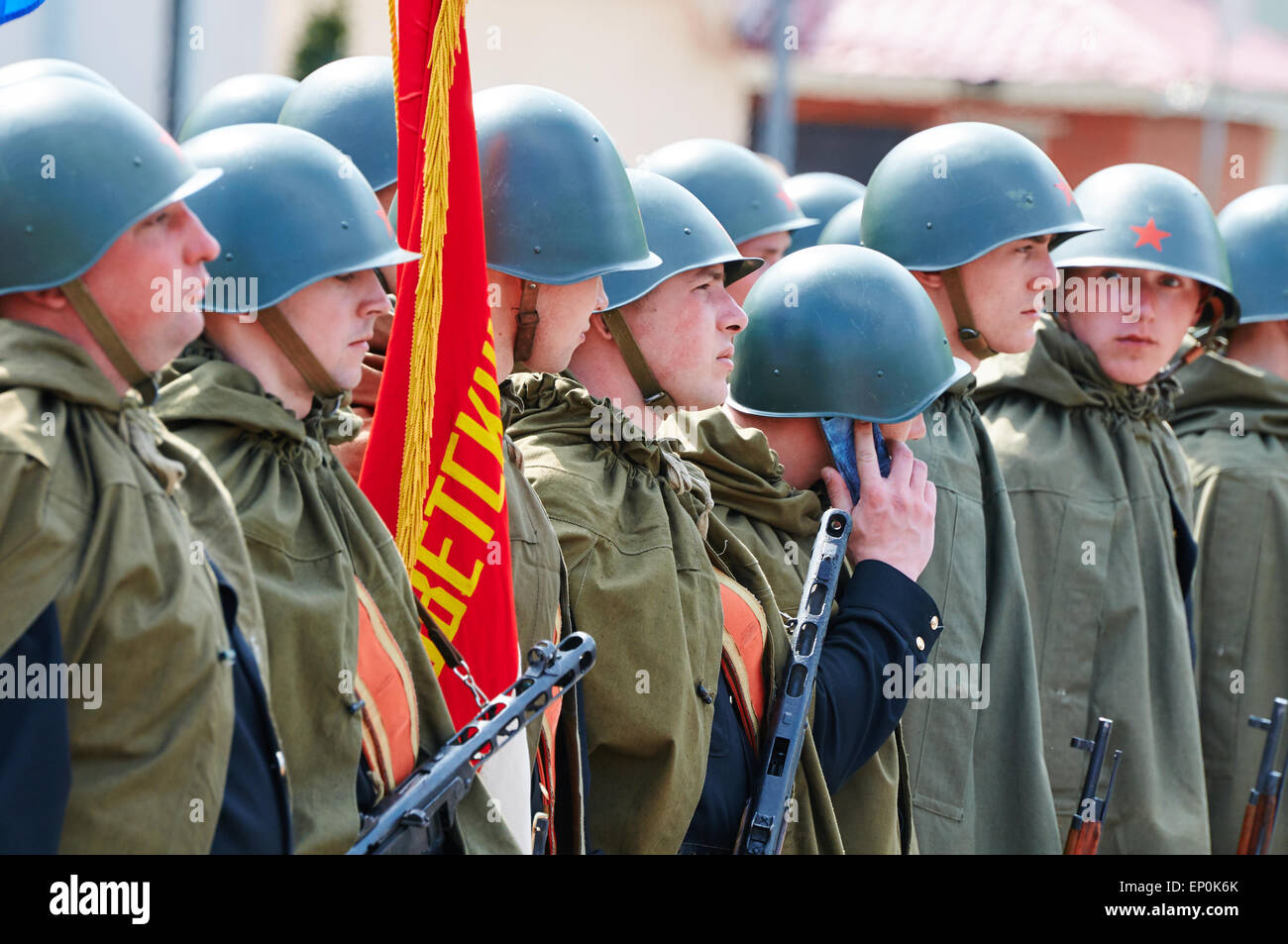 Celebrating the 70th anniversary of the Victory Day (WWII), Soviet soldiers in helmets and cloaks Stock Photo