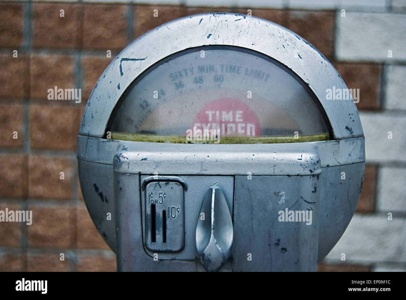 Vintage parking meter with red expired sign. Stock Photo