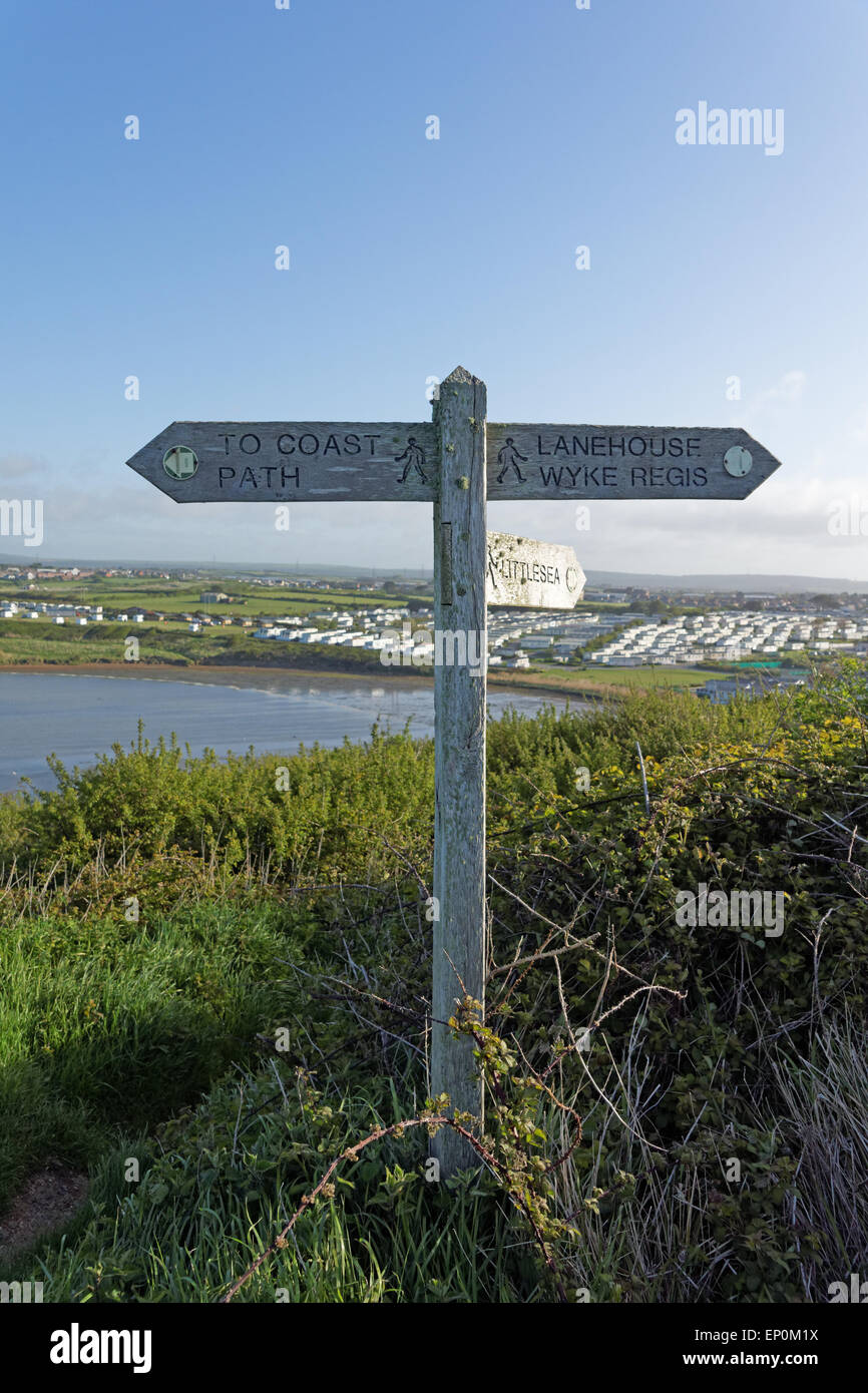 Fleet lagoon in spring time with signpost. Stock Photo
