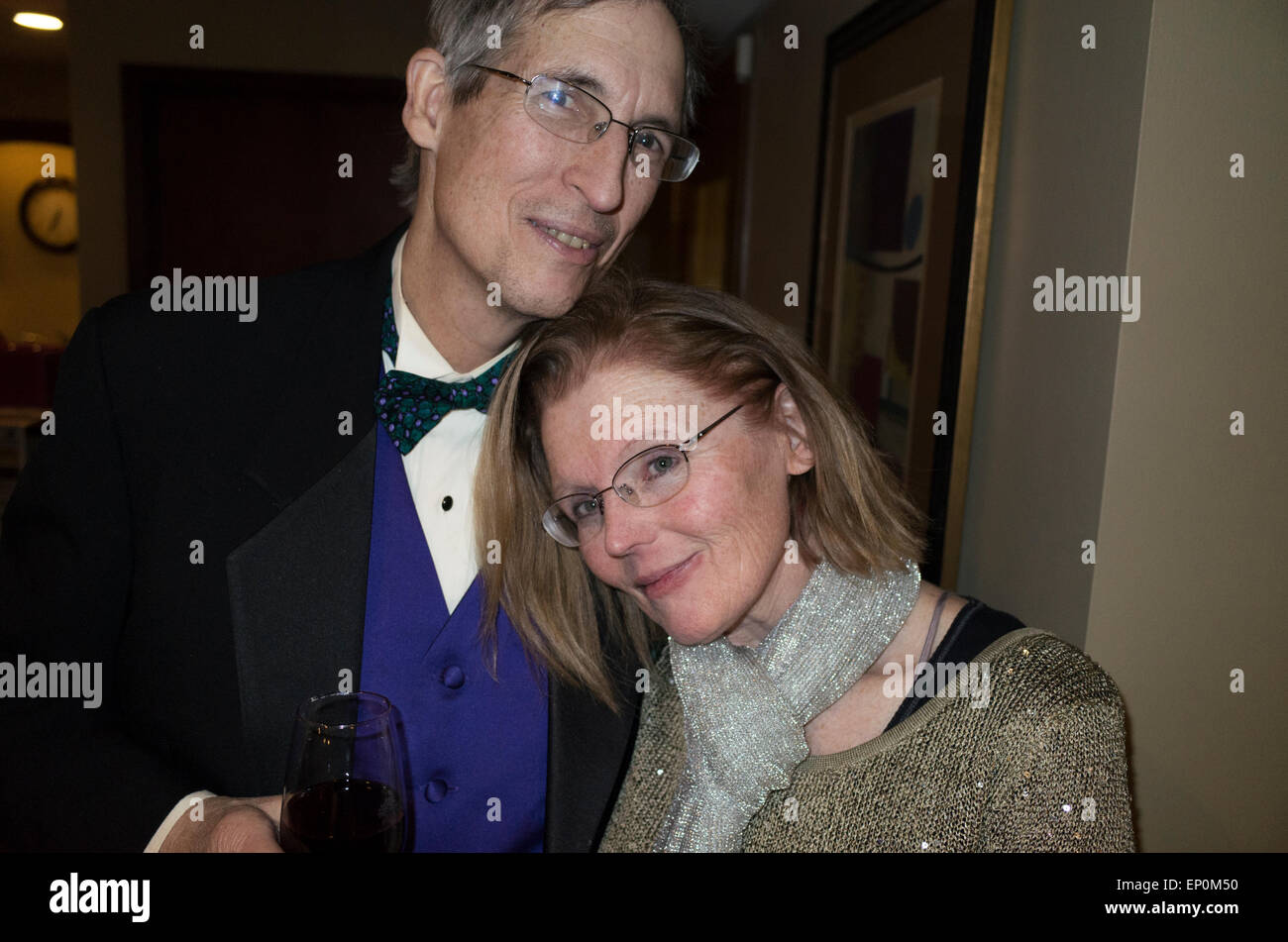 Lovely mature adult couple in formal attire enjoying an Academy Award party. St Louis Park Minnesota MN USA Stock Photo