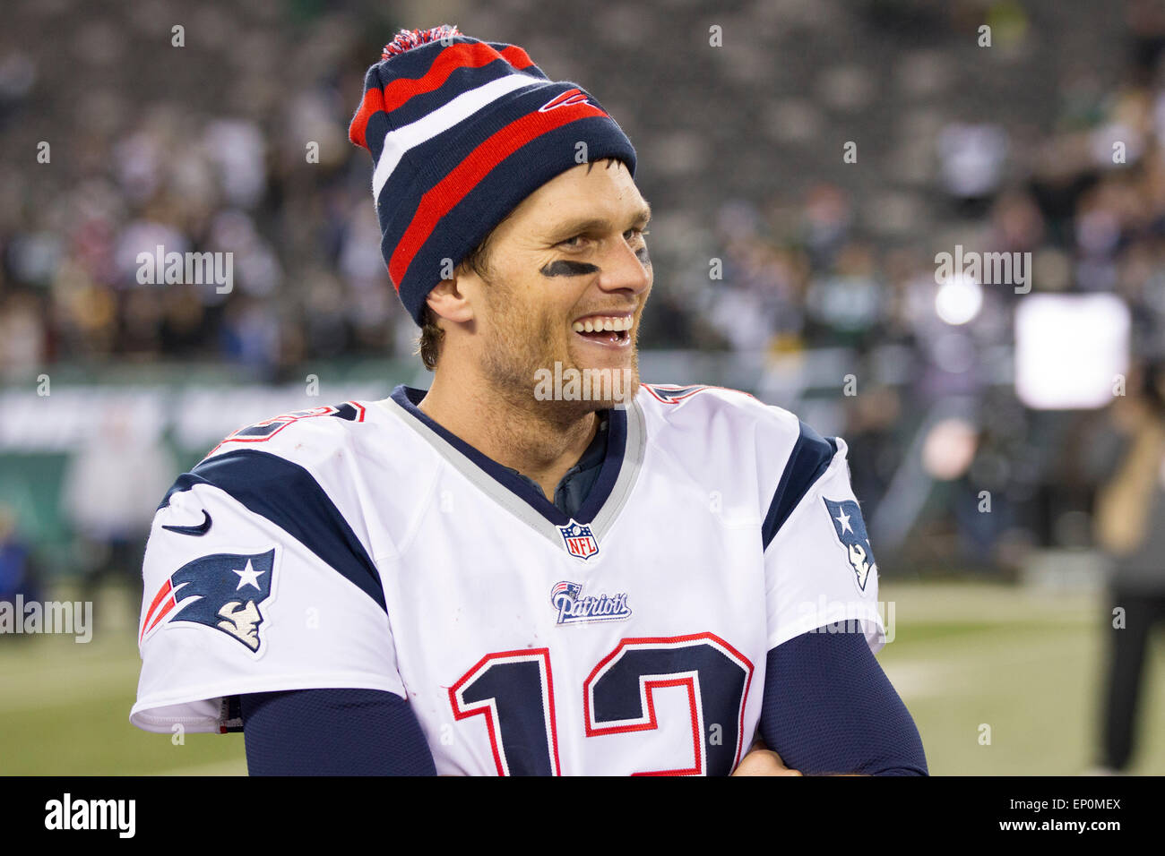 May 11, 2015 - FILE PHOTO - New England Patriots quaterback Tom Brady (12) suspended four games for punishment deflating footballs in the AFC Championship game. Pictured: May 11, 2015 - FILE PHOTO - New England Patriots quaterback Tom Brady (12) suspended four games for punishment deflating footballs in the AFC Championship game. Pictured: November 22, 2012: New England Patriots quarterback Tom Brady (12) looks on with a knit cap on following the NFL Thanksgiving Day game between the New England Patriots and the New York Jets at MetLife Stadium in East Rutherford, New Jersey. The New England P Stock Photo