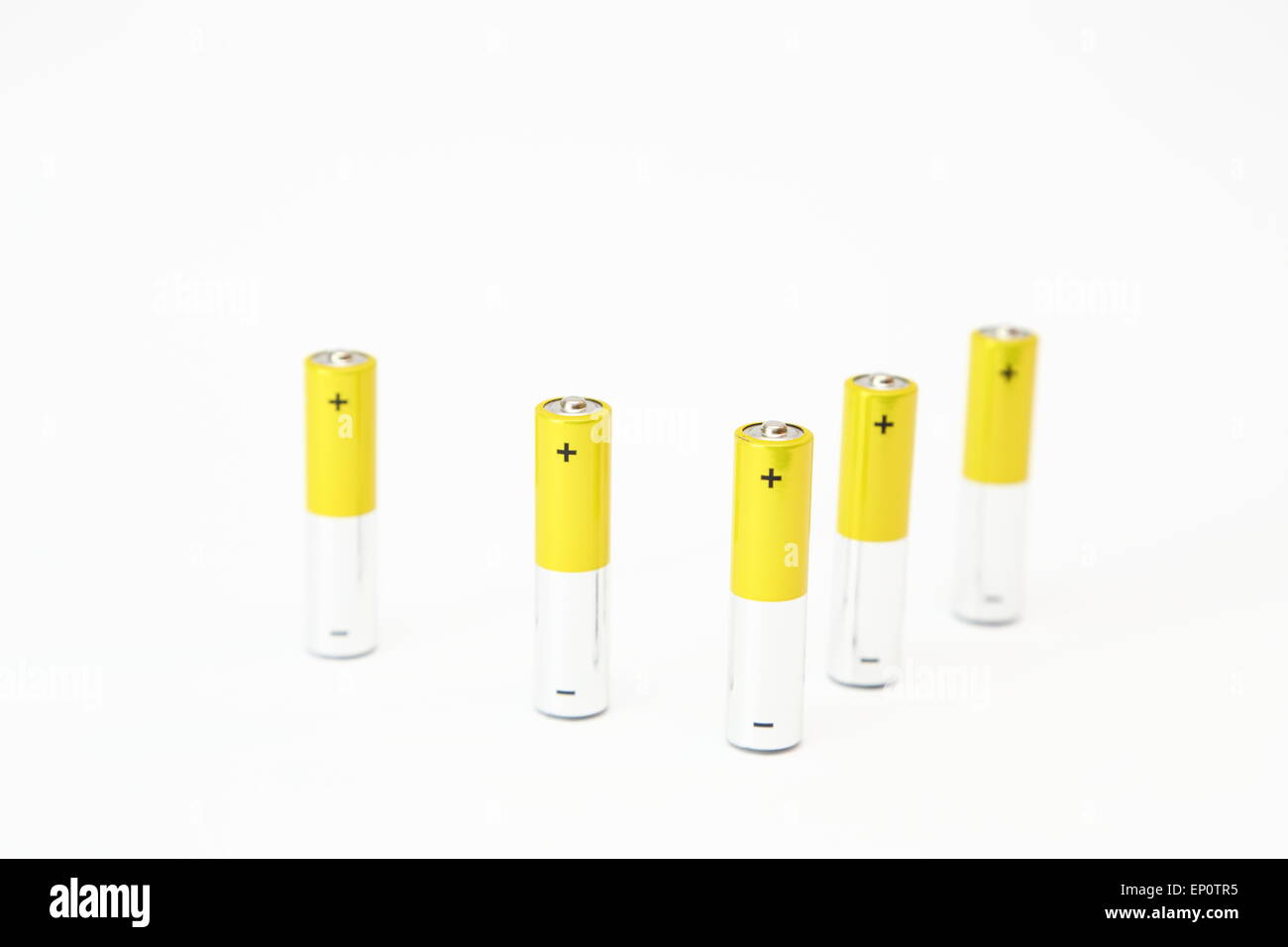 Alkaline batteries on white background. Stock Photo