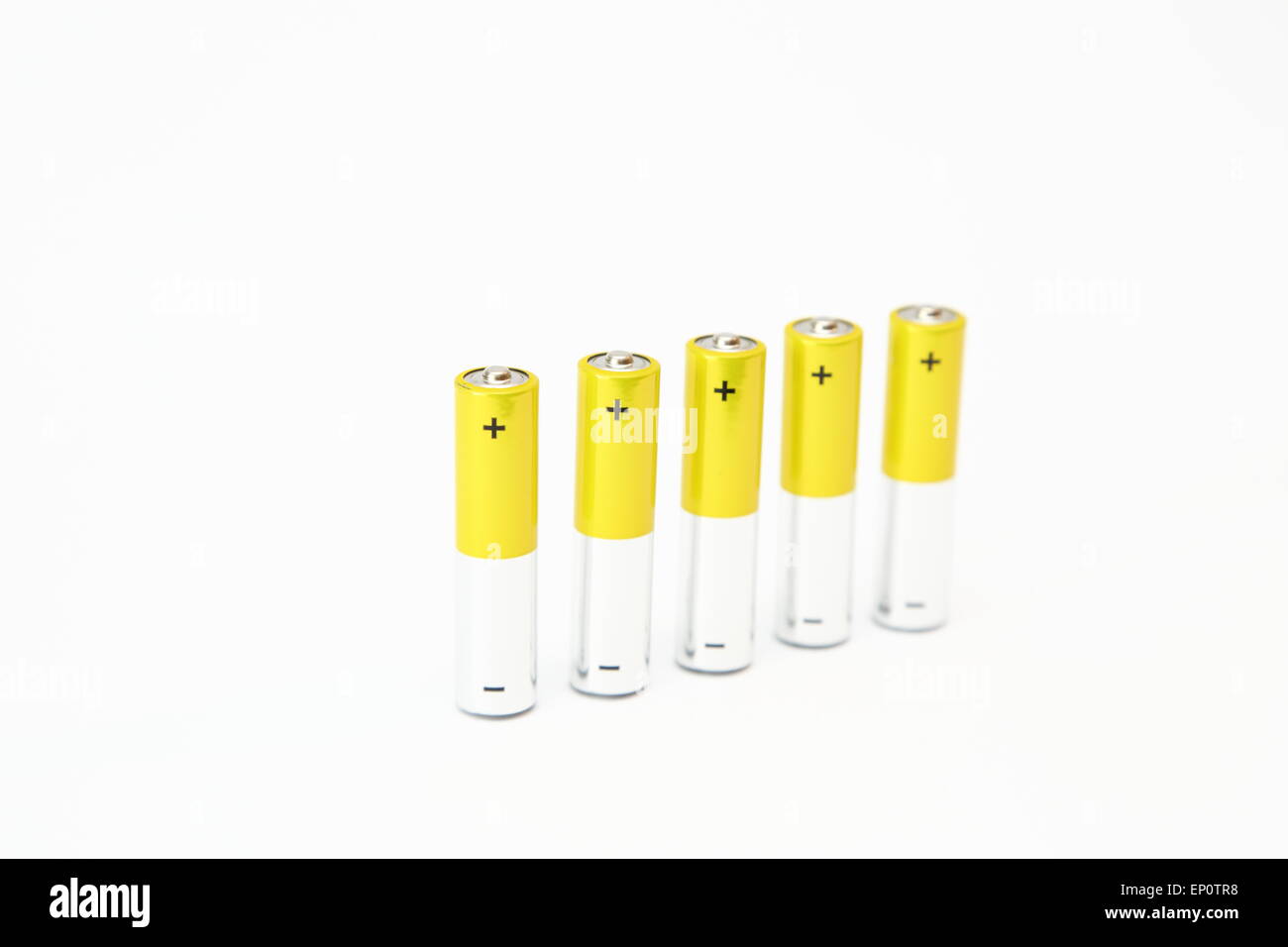 Alkaline batteries on white background. Stock Photo